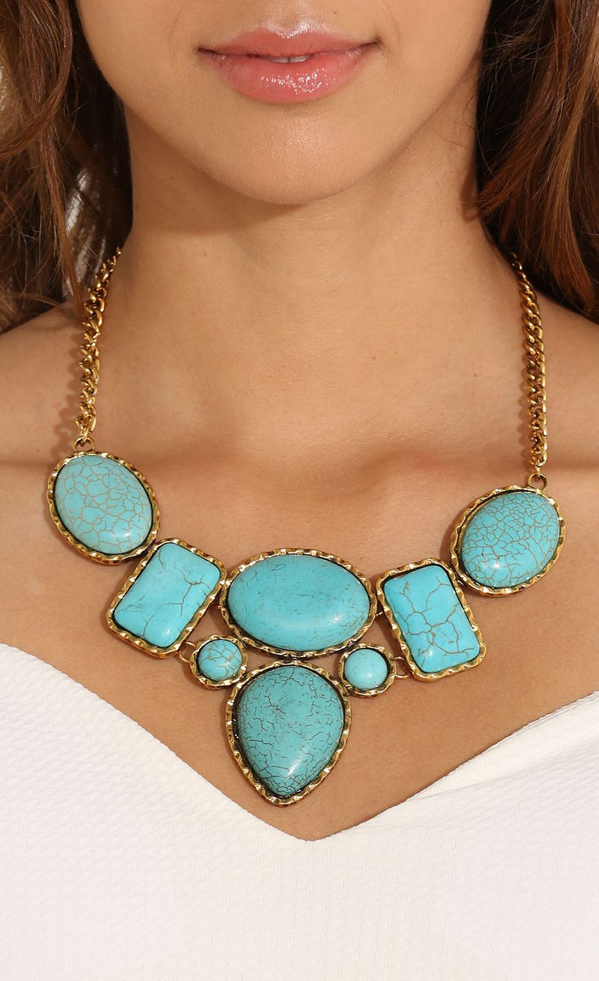 Picture Turquoise Stone Gold Necklace. Source: https://media-img.lucyinthesky.com/data/May15_2/850xAUTO/0Y5A1903.JPG