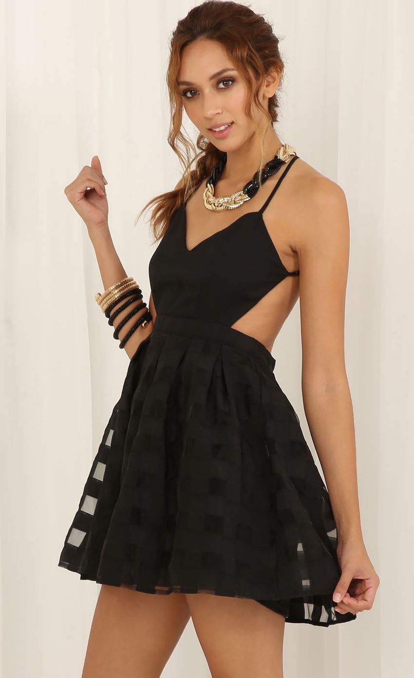 Picture Geometrical A-line Dress In Black. Source: https://media-img.lucyinthesky.com/data/May15_2/850xAUTO/0Y5A5673.JPG