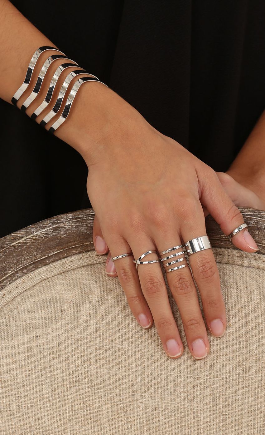 Picture Silver Wave Bracelet and Rings. Source: https://media-img.lucyinthesky.com/data/May15_2/850xAUTO/0Y5A5790.JPG