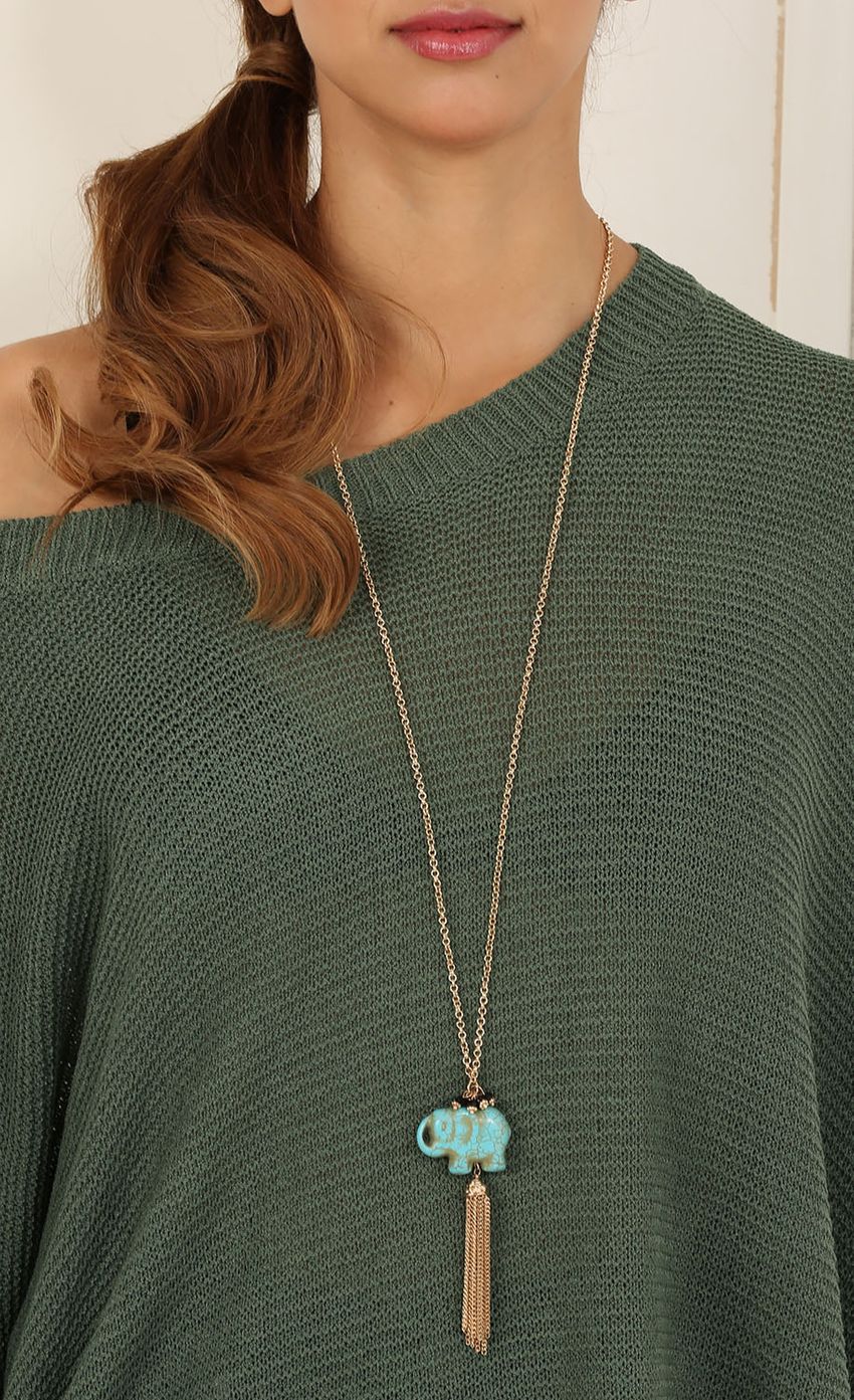 Picture Fringed Long Elephant Necklace In Gold. Source: https://media-img.lucyinthesky.com/data/May15_2/850xAUTO/0Y5A6523.JPG