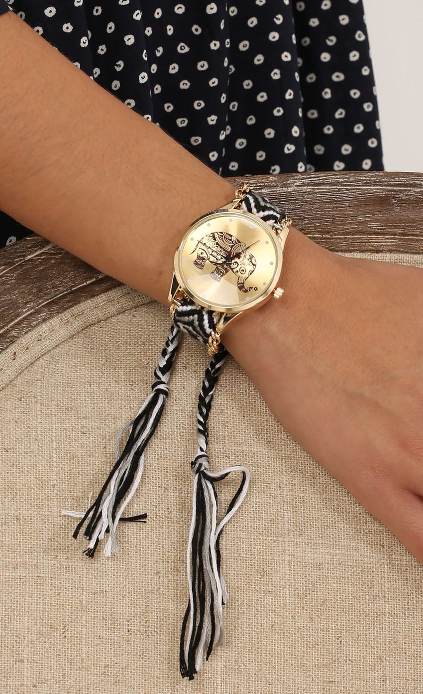 Picture Woven Elephant Watch In Gold. Source: https://media-img.lucyinthesky.com/data/May15_2/850xAUTO/0Y5A9876.JPG