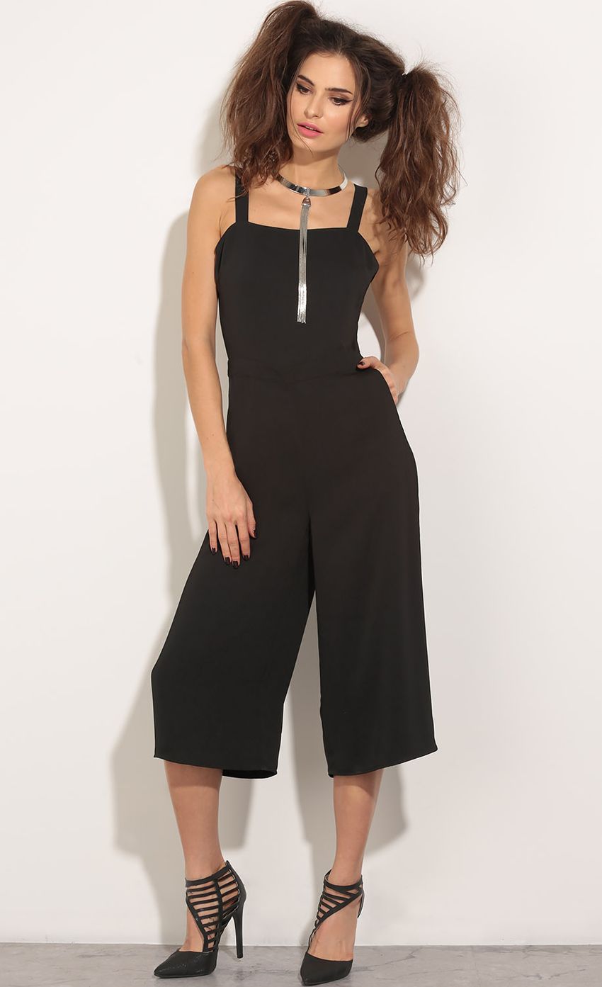 Picture Grommet Lace-Up Jumpsuit In Black. Source: https://media-img.lucyinthesky.com/data/May16_1/850xAUTO/0Y5A0101.JPG