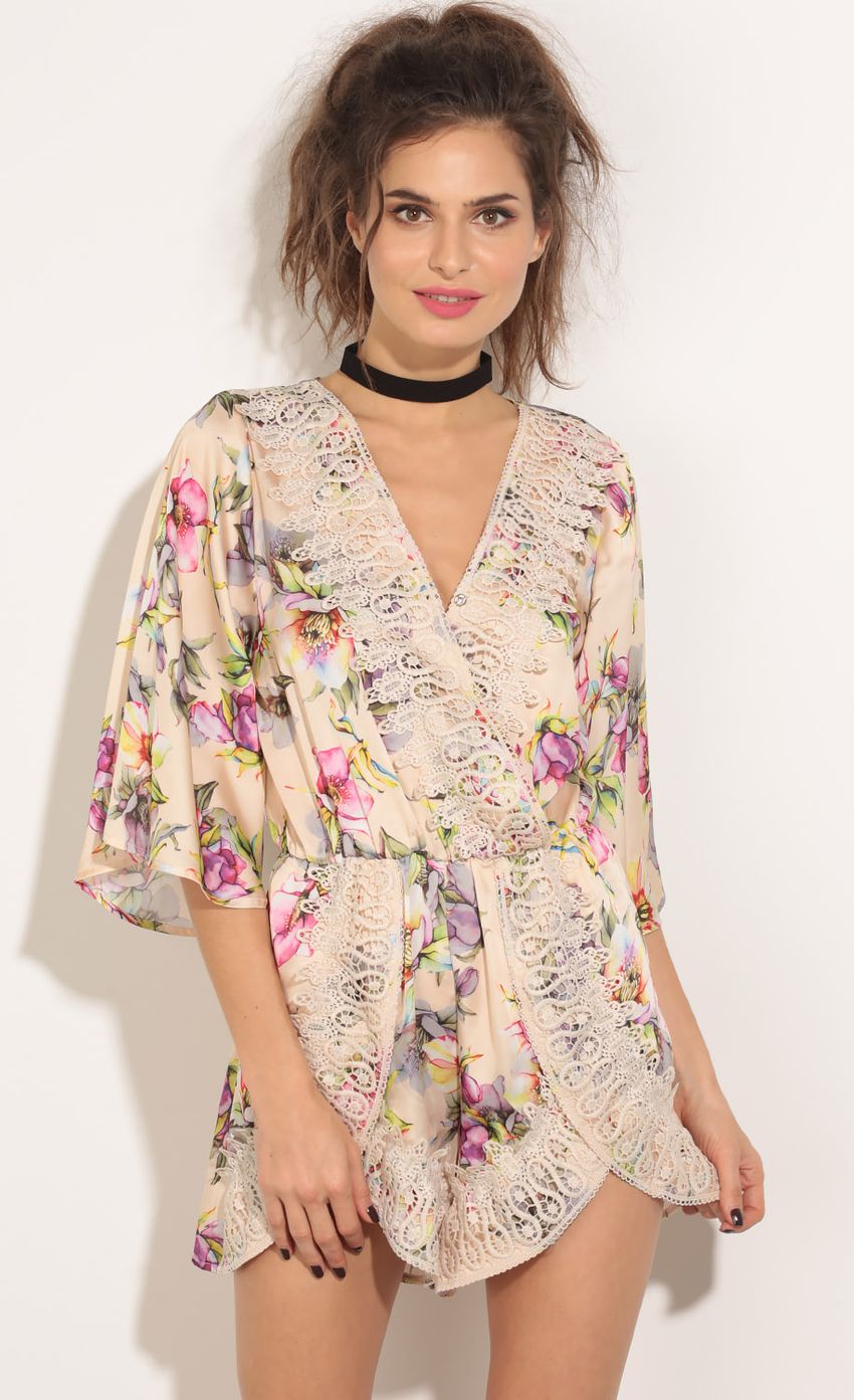 Picture Floral Print Romper In Vanilla. Source: https://media-img.lucyinthesky.com/data/May16_1/850xAUTO/0Y5A1313.JPG