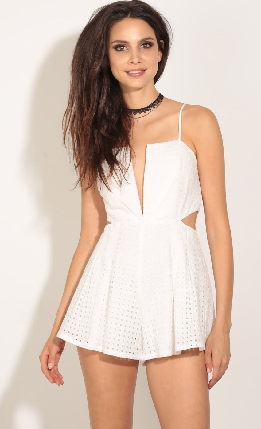 Picture Textured Plunge Romper In White. Source: https://media-img.lucyinthesky.com/data/May16_1/850xAUTO/0Y5A5480.JPG