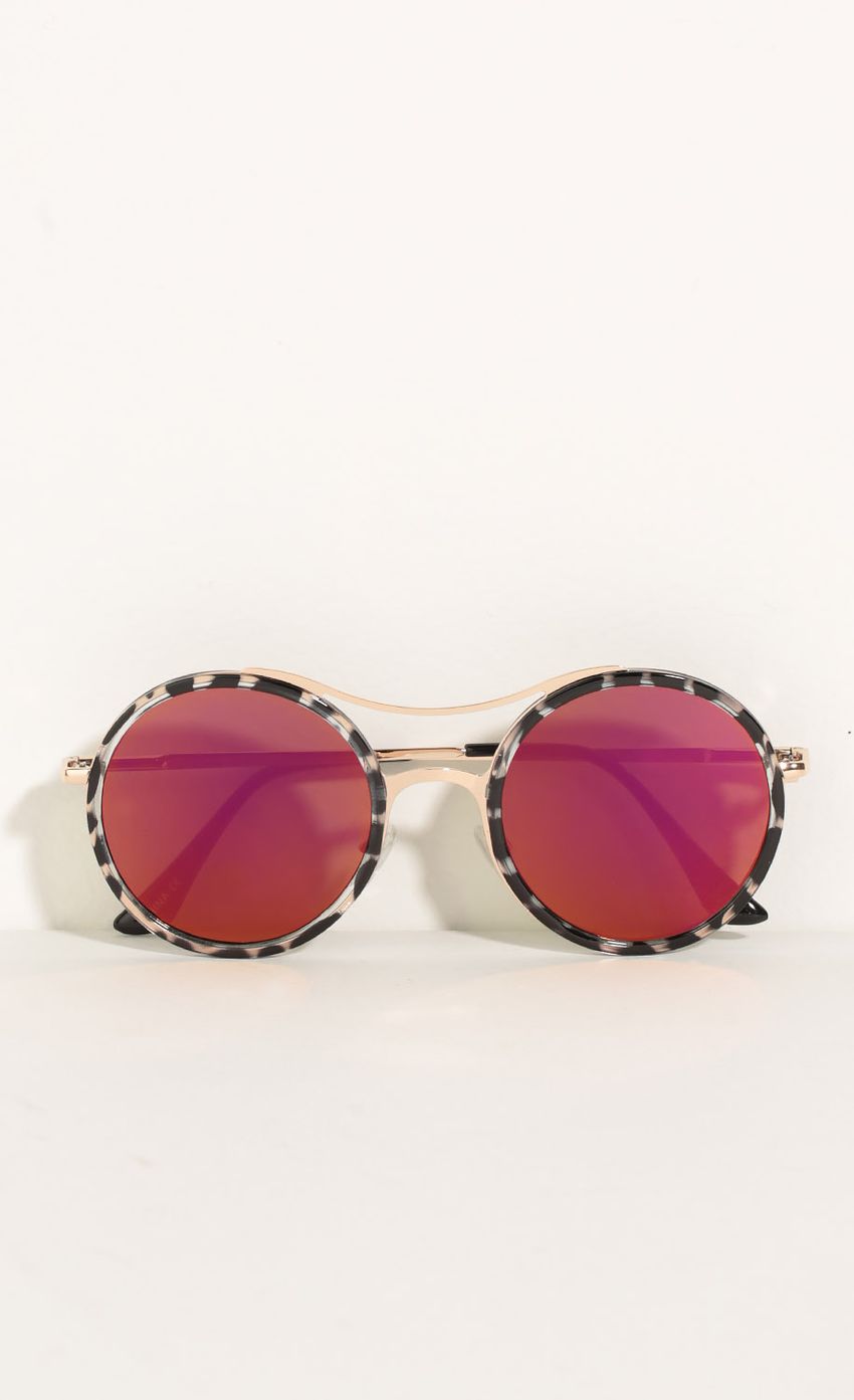 Picture Retro Inspired Sunglasses In Pink. Source: https://media-img.lucyinthesky.com/data/May16_2/850xAUTO/0Y5A1842.JPG