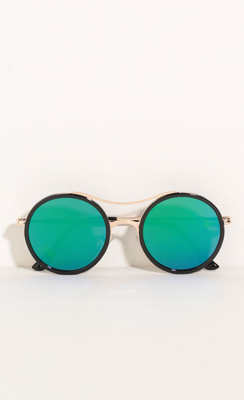 Picture Retro Inspired Sunglasses In Sea Green. Source: https://media-img.lucyinthesky.com/data/May16_2/850xAUTO/0Y5A1846.JPG