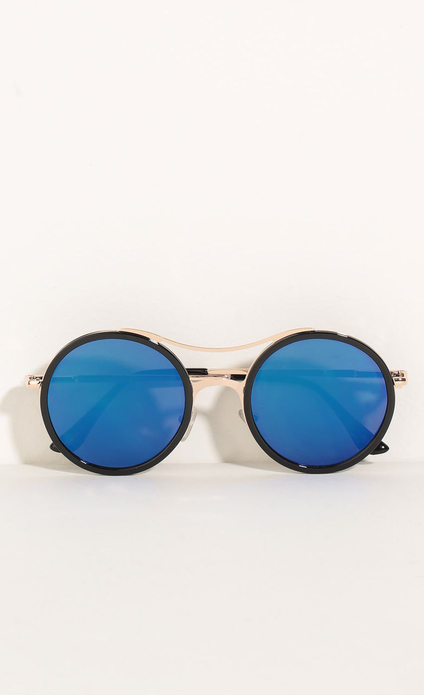 Picture Retro Inspired Sunglasses In Blue. Source: https://media-img.lucyinthesky.com/data/May16_2/850xAUTO/0Y5A1854.JPG