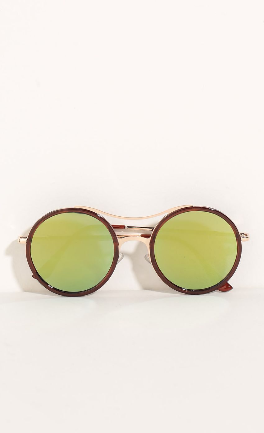 Picture Retro Inspired Sunglasses In Green. Source: https://media-img.lucyinthesky.com/data/May16_2/850xAUTO/0Y5A1861.JPG