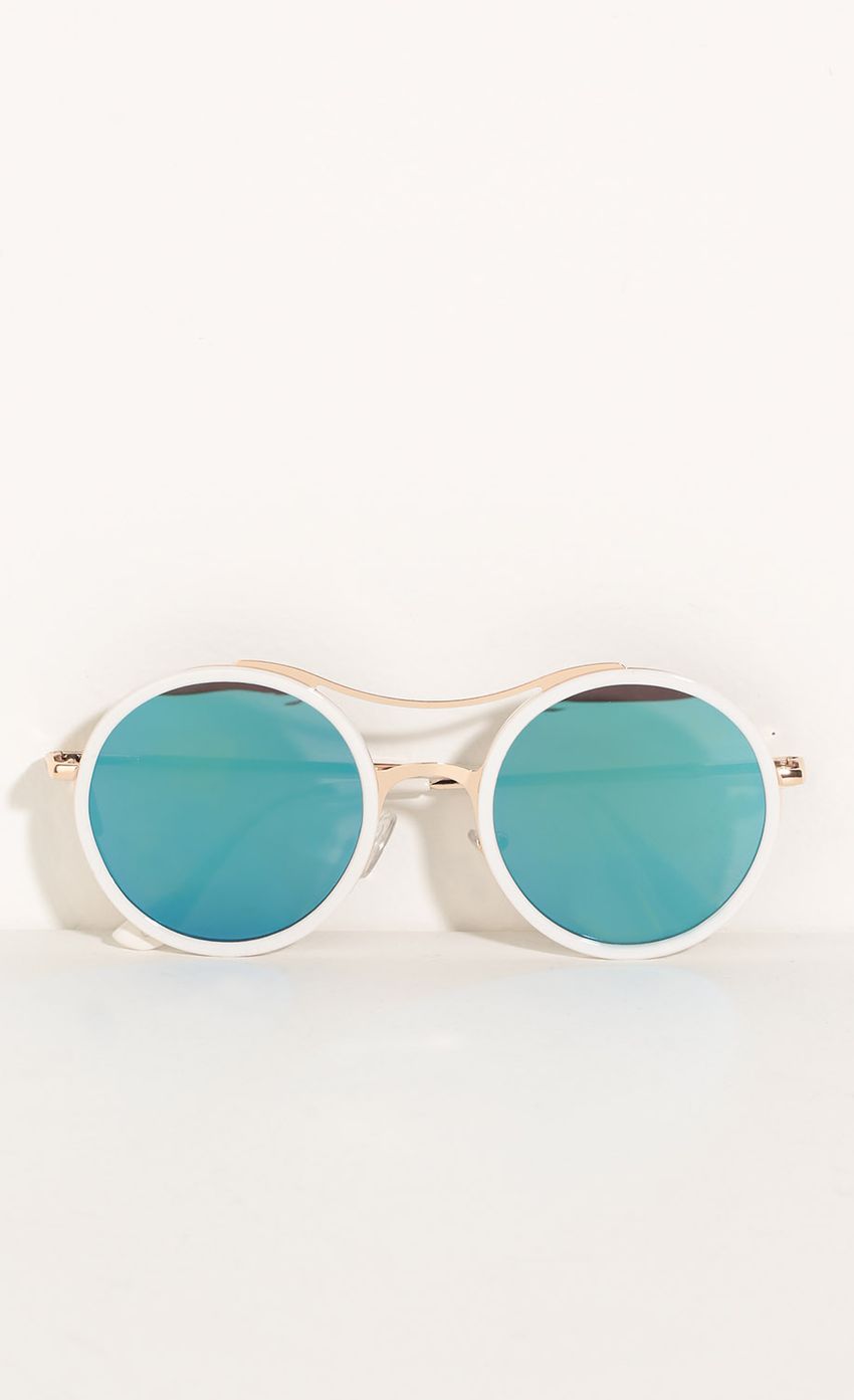 Picture Retro Inspired Sunglasses In Teal. Source: https://media-img.lucyinthesky.com/data/May16_2/850xAUTO/0Y5A1868.JPG