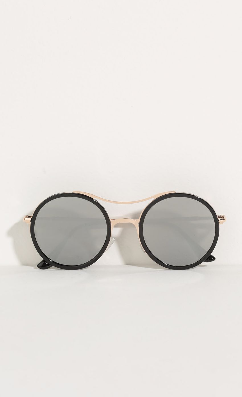 Picture Retro Inspired Sunglasses In Black. Source: https://media-img.lucyinthesky.com/data/May16_2/850xAUTO/0Y5A5301.JPG