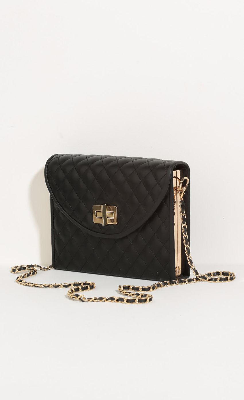 Picture Quilted Leather Clutch Purse In Black. Source: https://media-img.lucyinthesky.com/data/May16_2/850xAUTO/0Y5A8586.JPG