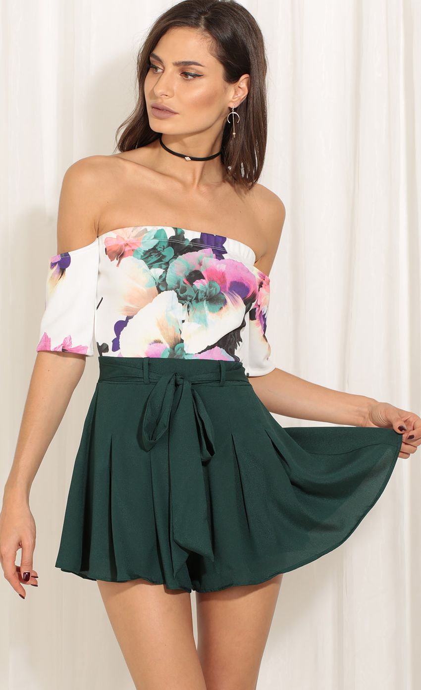 Picture Floral Abstract Romper In Forest Green. Source: https://media-img.lucyinthesky.com/data/May17_1/850xAUTO/0Y5A0791.JPG