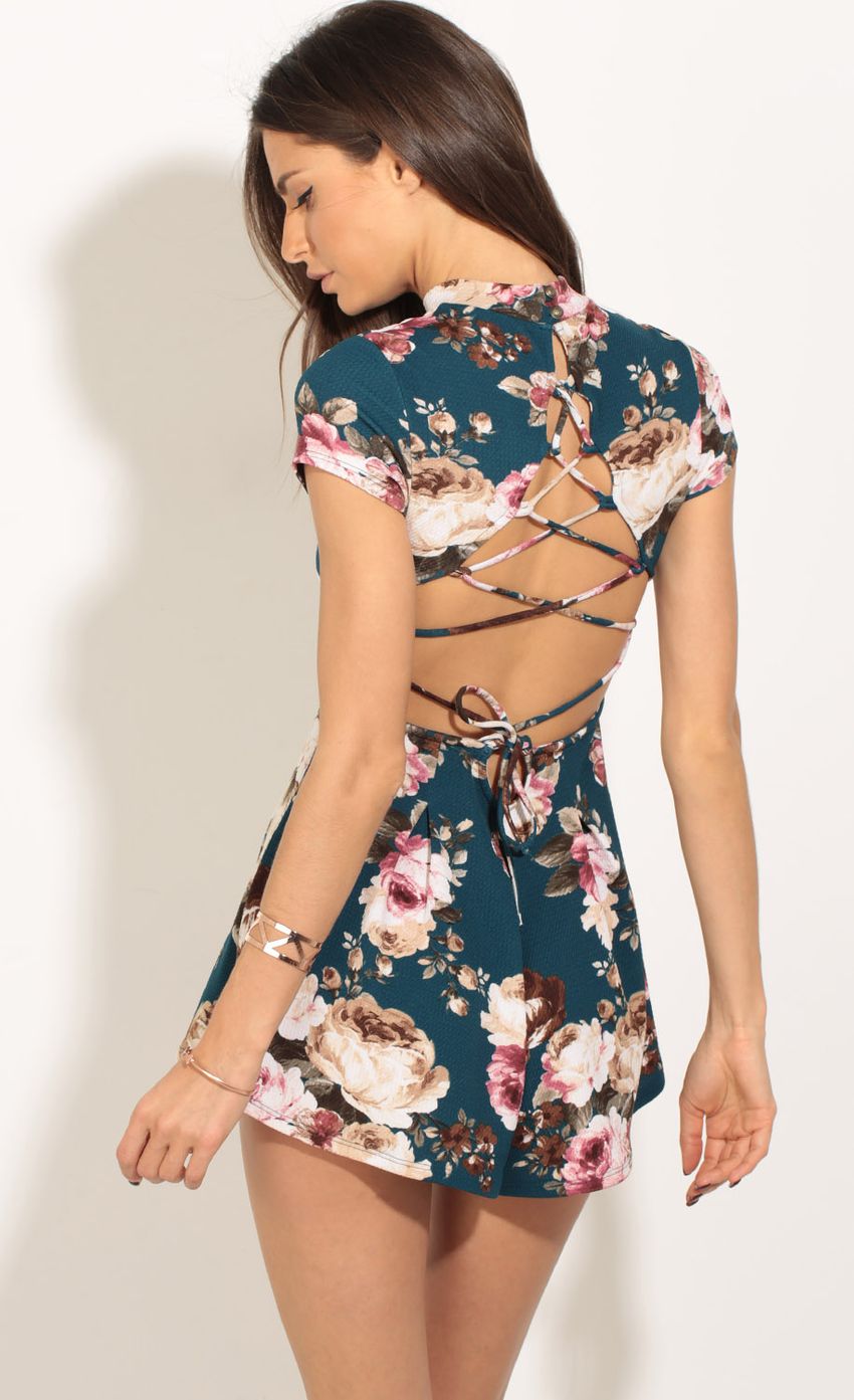 Picture Floral High Neck Romper In Blue. Source: https://media-img.lucyinthesky.com/data/May17_1/850xAUTO/0Y5A9542.JPG
