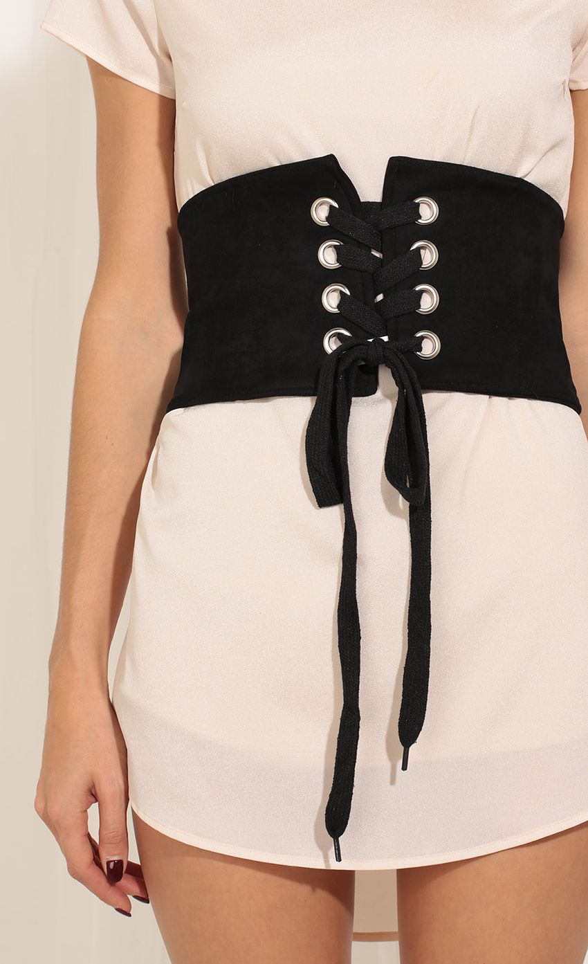 Picture Wide Waist Lace-Up Corset Belt In Black. Source: https://media-img.lucyinthesky.com/data/May17_2/850xAUTO/0Y5A0227.JPG