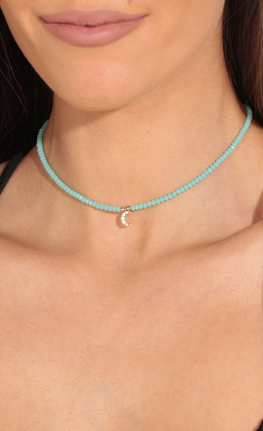Picture Beaded Shimmer Moon Choker In Turquoise. Source: https://media-img.lucyinthesky.com/data/May17_2/850xAUTO/0Y5A6353.JPG