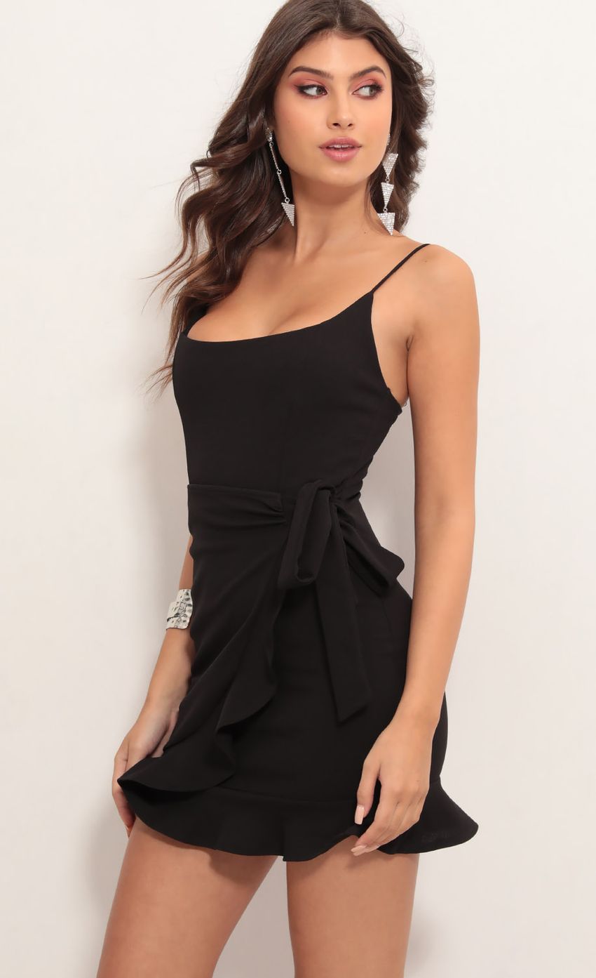 Picture Ruffle Tie Dress in Black. Source: https://media-img.lucyinthesky.com/data/May19_1/850xAUTO/781A5552.JPG
