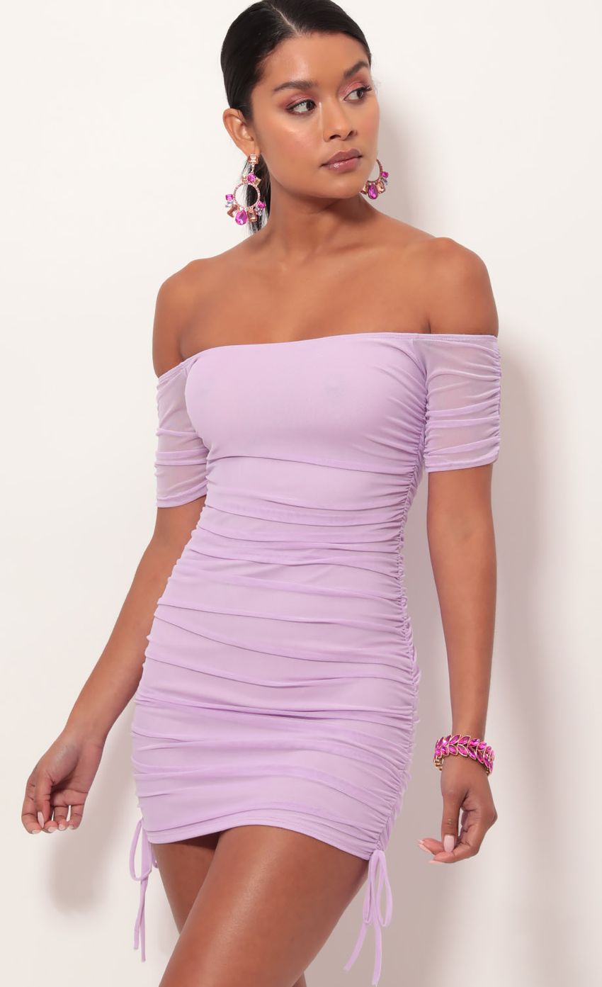 Picture Aria Ruched Dress in Lavender. Source: https://media-img.lucyinthesky.com/data/May19_2/850xAUTO/781A0070.JPG