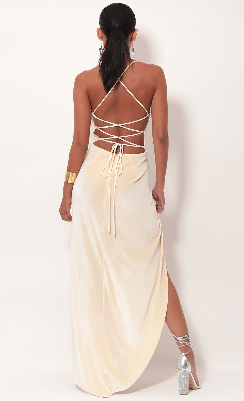 Picture Velvet Luxe Maxi Dress in Vanilla. Source: https://media-img.lucyinthesky.com/data/May19_2/850xAUTO/781A0295.JPG