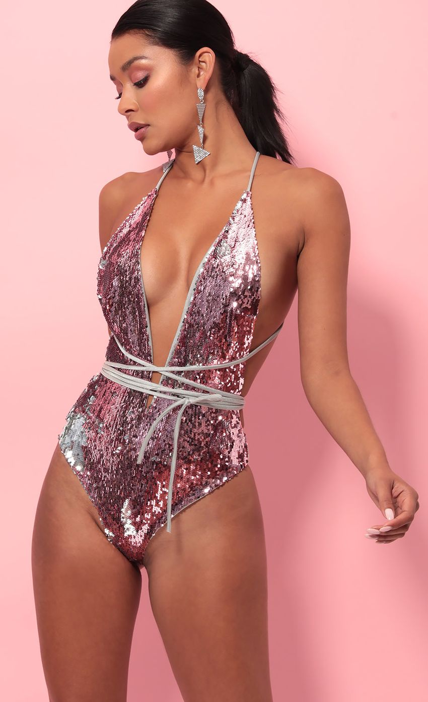 Picture Pacific Plunge Sequin Swimsuit in Mauve Silver. Source: https://media-img.lucyinthesky.com/data/May19_2/850xAUTO/781A1178FB.JPG