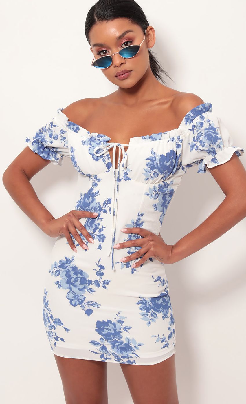 Picture Mallory Puff Sleeve Dress in Blue Floral. Source: https://media-img.lucyinthesky.com/data/May19_2/850xAUTO/781A8745.JPG