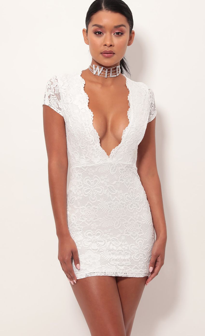 Picture Kendra Plunge Lace Dress in White. Source: https://media-img.lucyinthesky.com/data/May19_2/850xAUTO/781A9036.JPG