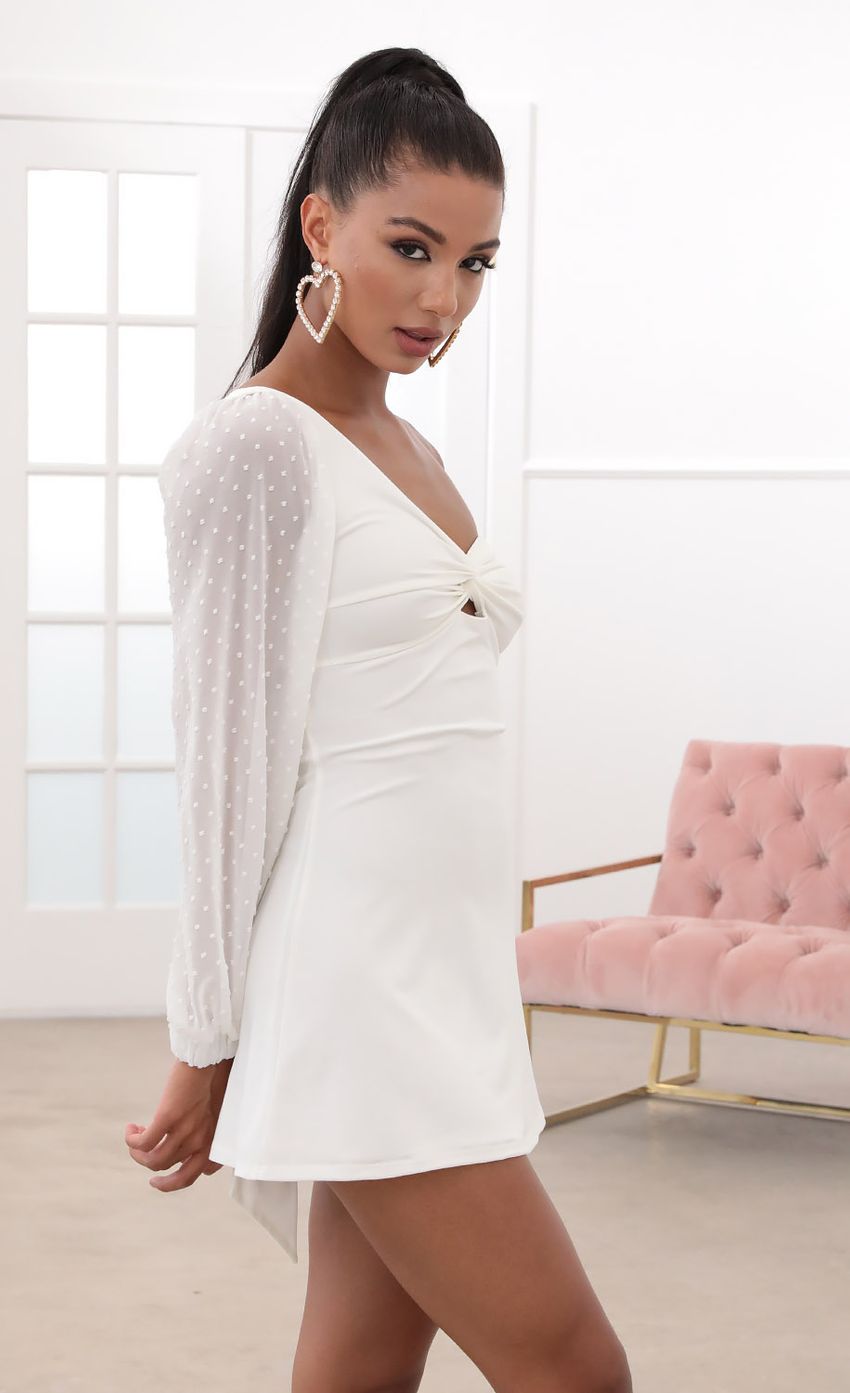 Picture Shoulder Puff A-line Dress in White. Source: https://media-img.lucyinthesky.com/data/May20_2/850xAUTO/781A2156.JPG