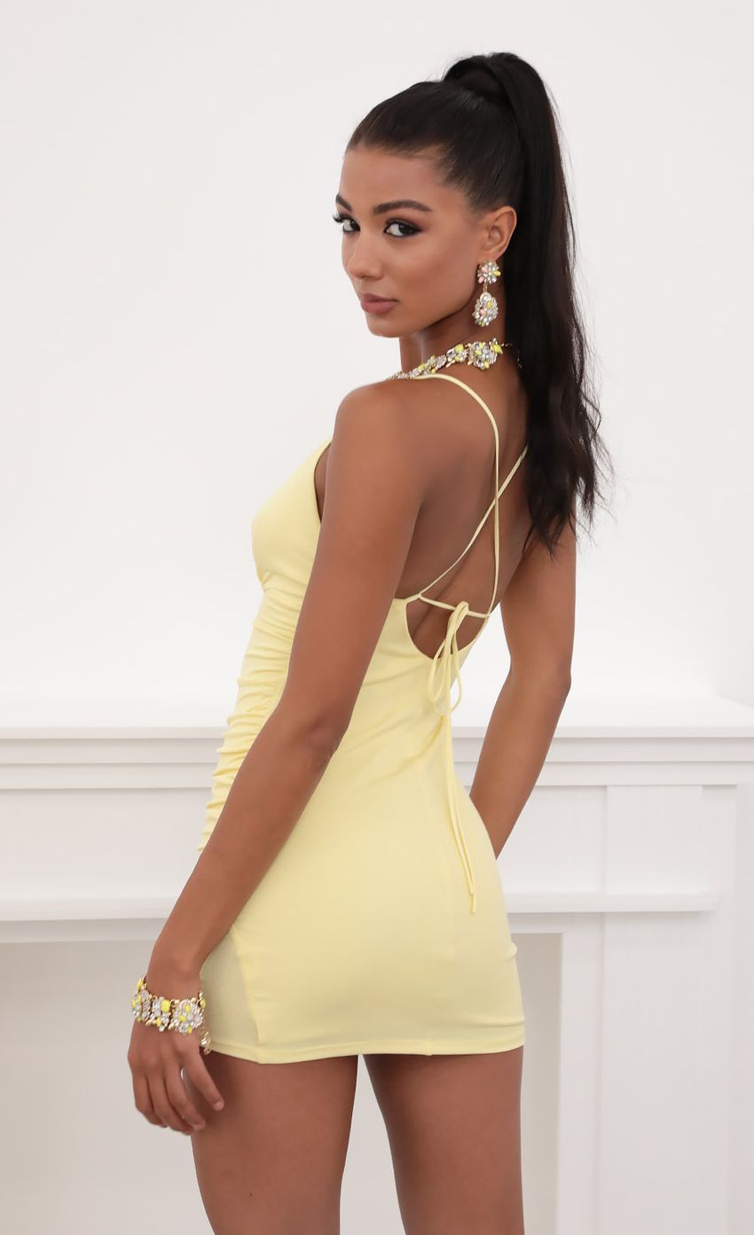 Picture Ruched Cross-Back Dress in Yellow. Source: https://media-img.lucyinthesky.com/data/May20_2/850xAUTO/781A5193.JPG