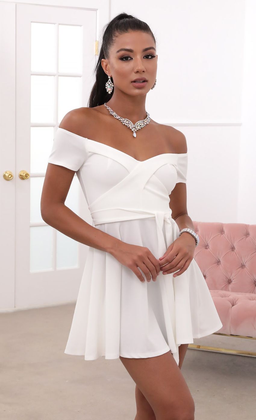 Picture Pleated A-line Dress in White. Source: https://media-img.lucyinthesky.com/data/May20_2/850xAUTO/781A5959.JPG