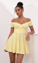 Picture Ambrose Pleated A-line Dress in Yellow. Source: https://media-img.lucyinthesky.com/data/May21_1/150xAUTO/1V9A1297S.JPG