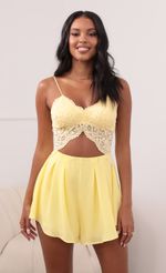 Picture Cutout Lace Romper in Yellow. Source: https://media-img.lucyinthesky.com/data/May21_1/150xAUTO/1V9A37921.JPG