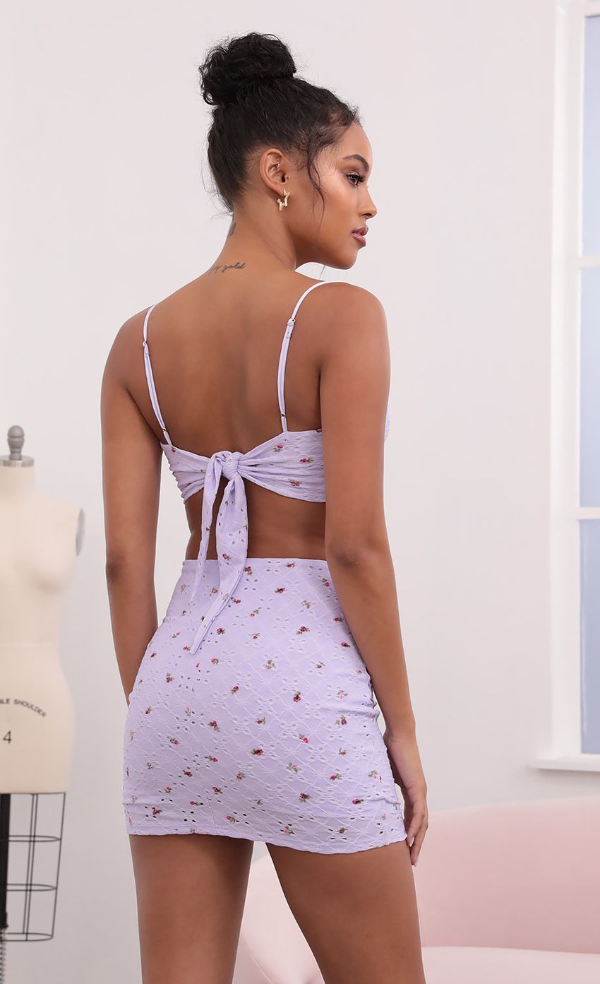 Picture Back Tie Crop top Set in Lilac Floral Eyelet. Source: https://media-img.lucyinthesky.com/data/May21_1/850xAUTO/1V9A1030.JPG