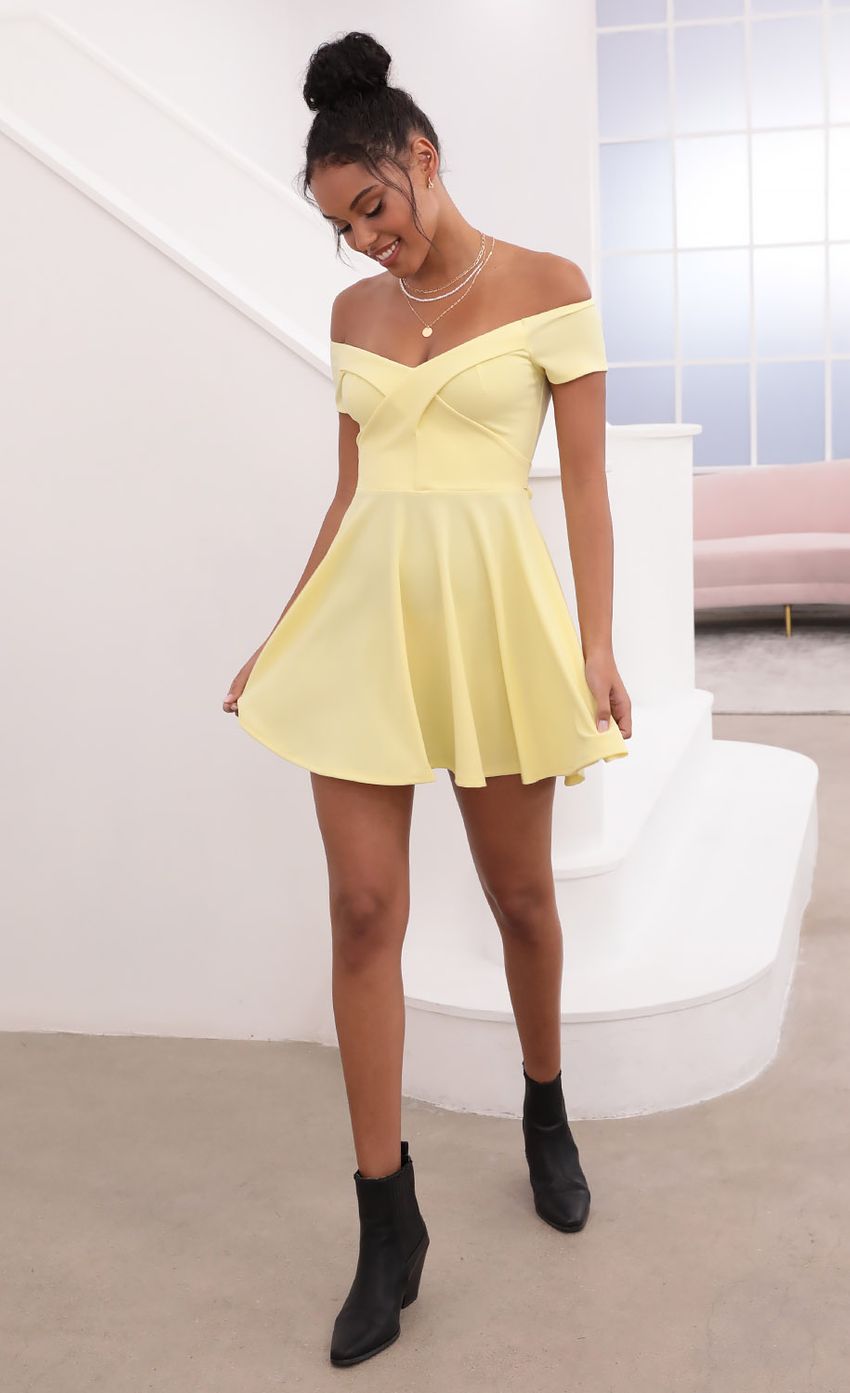 Picture Ambrose Pleated A-line Dress in Yellow. Source: https://media-img.lucyinthesky.com/data/May21_1/850xAUTO/1V9A1183.JPG