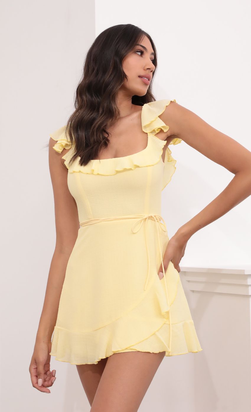 Picture Wrap Pebble Crepe Dress in Yellow. Source: https://media-img.lucyinthesky.com/data/May21_1/850xAUTO/1V9A3708.JPG