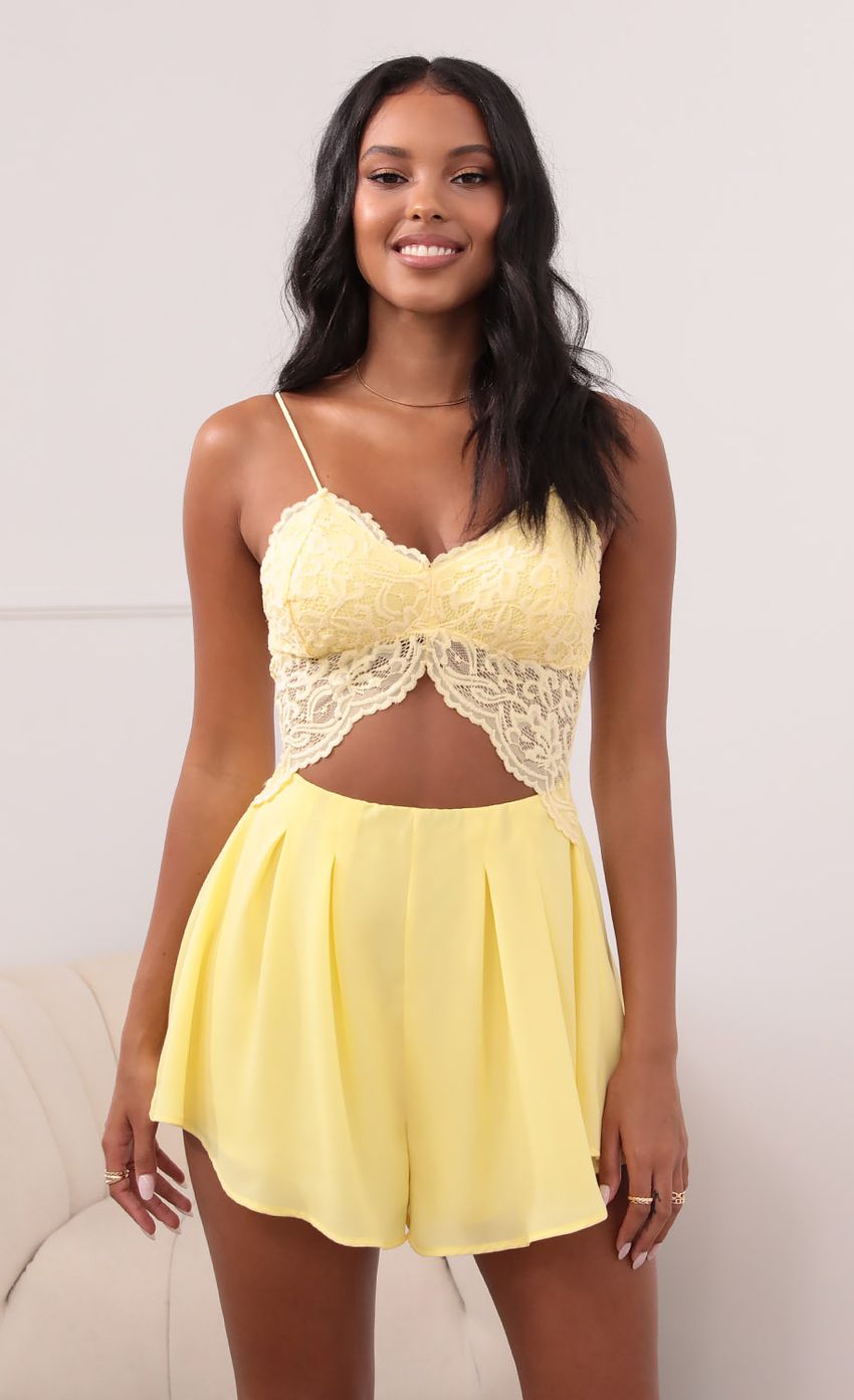 Picture Cutout Lace Romper in Yellow. Source: https://media-img.lucyinthesky.com/data/May21_1/850xAUTO/1V9A37921.JPG