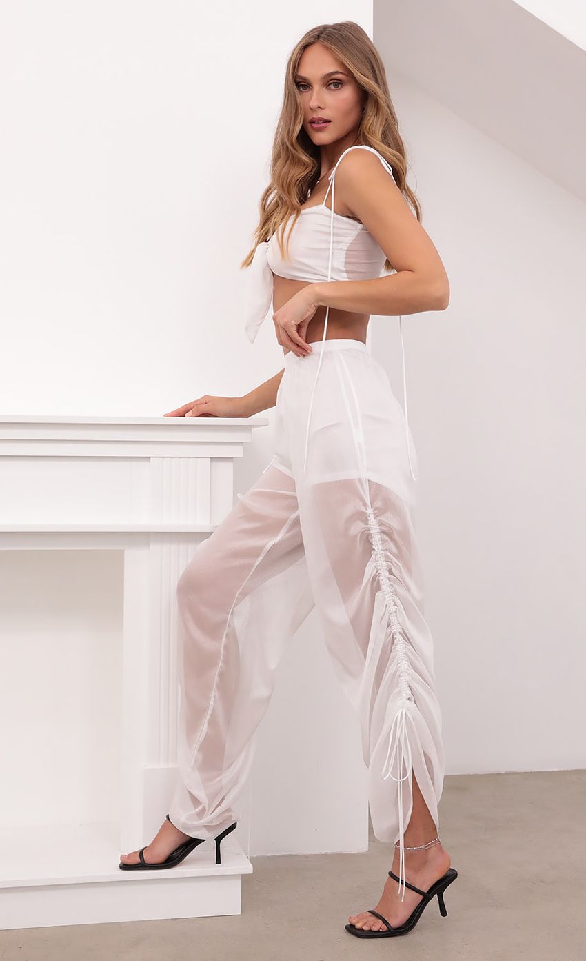 Picture Carly Ruched Pant Set in Sparkly White. Source: https://media-img.lucyinthesky.com/data/May21_1/850xAUTO/1V9A4488.JPG
