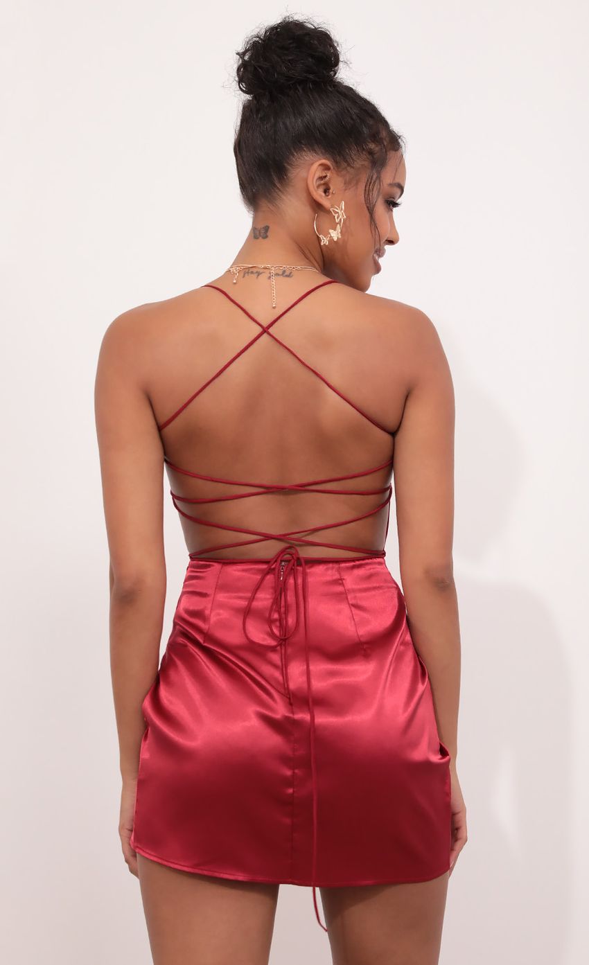 Picture Mini Satin Dress in Wine. Source: https://media-img.lucyinthesky.com/data/May21_1/850xAUTO/1V9A5848_COPY.JPG
