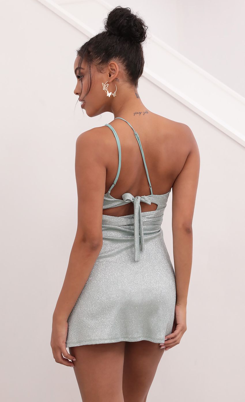 Picture One Shoulder Dress in Sparkling Aqua. Source: https://media-img.lucyinthesky.com/data/May21_1/850xAUTO/1V9A6023.JPG