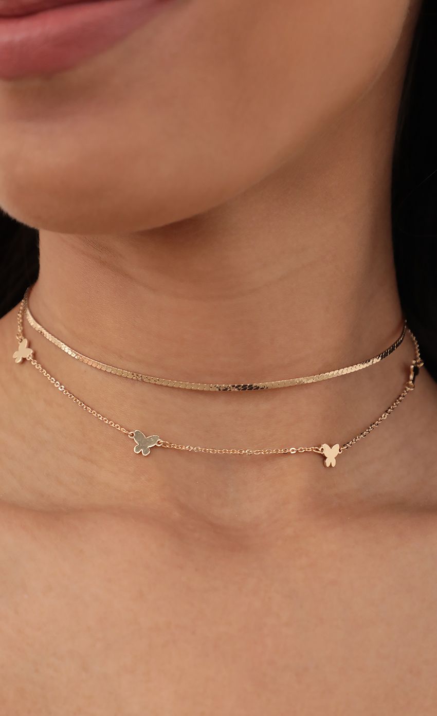 Picture Butterfly Double Choker in Gold. Source: https://media-img.lucyinthesky.com/data/May21_1/850xAUTO/AT2A3034.JPG