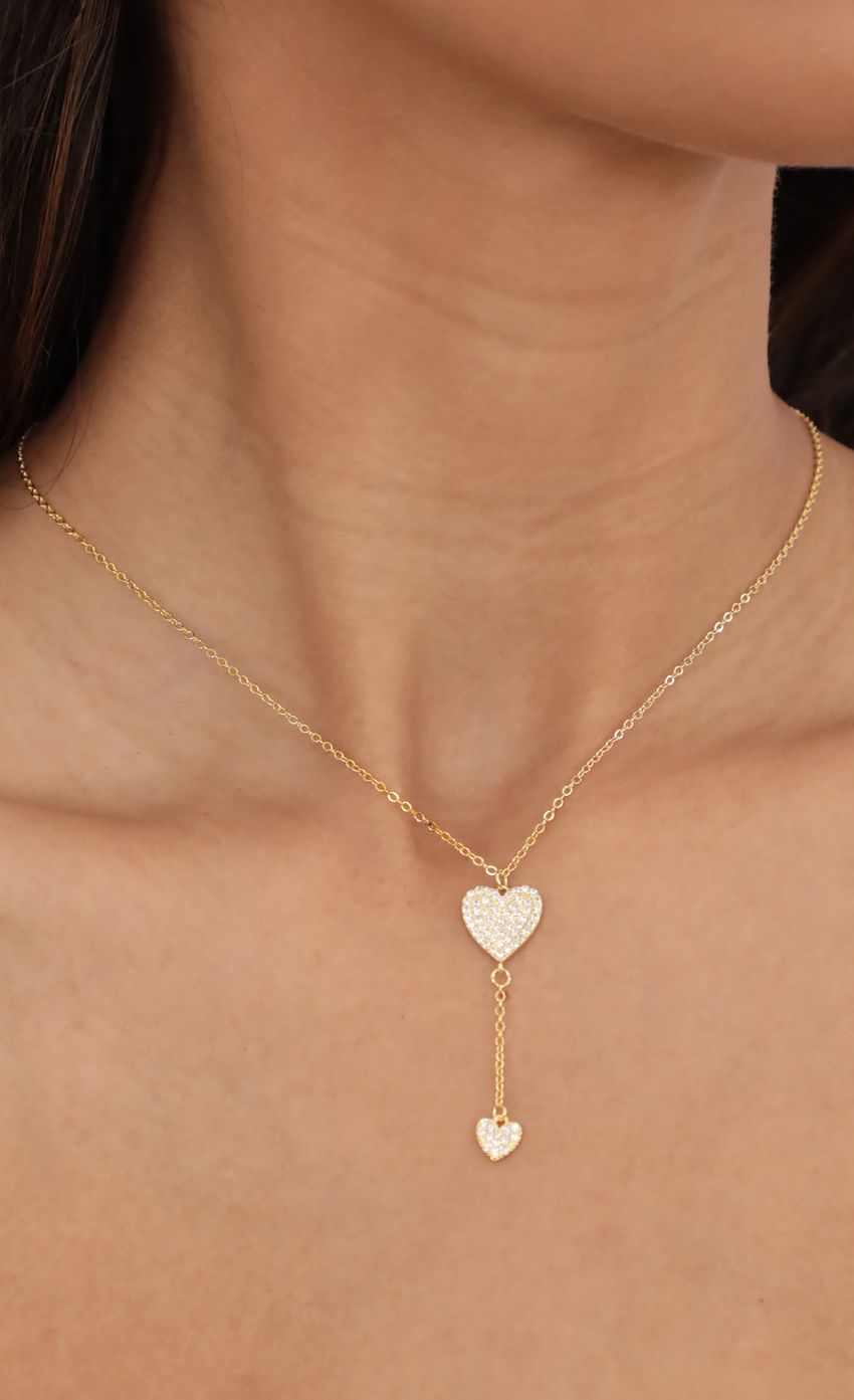 Picture Suspended Pave Hearts Mini Lariat. Source: https://media-img.lucyinthesky.com/data/May21_1/850xAUTO/AT2A4409.JPG