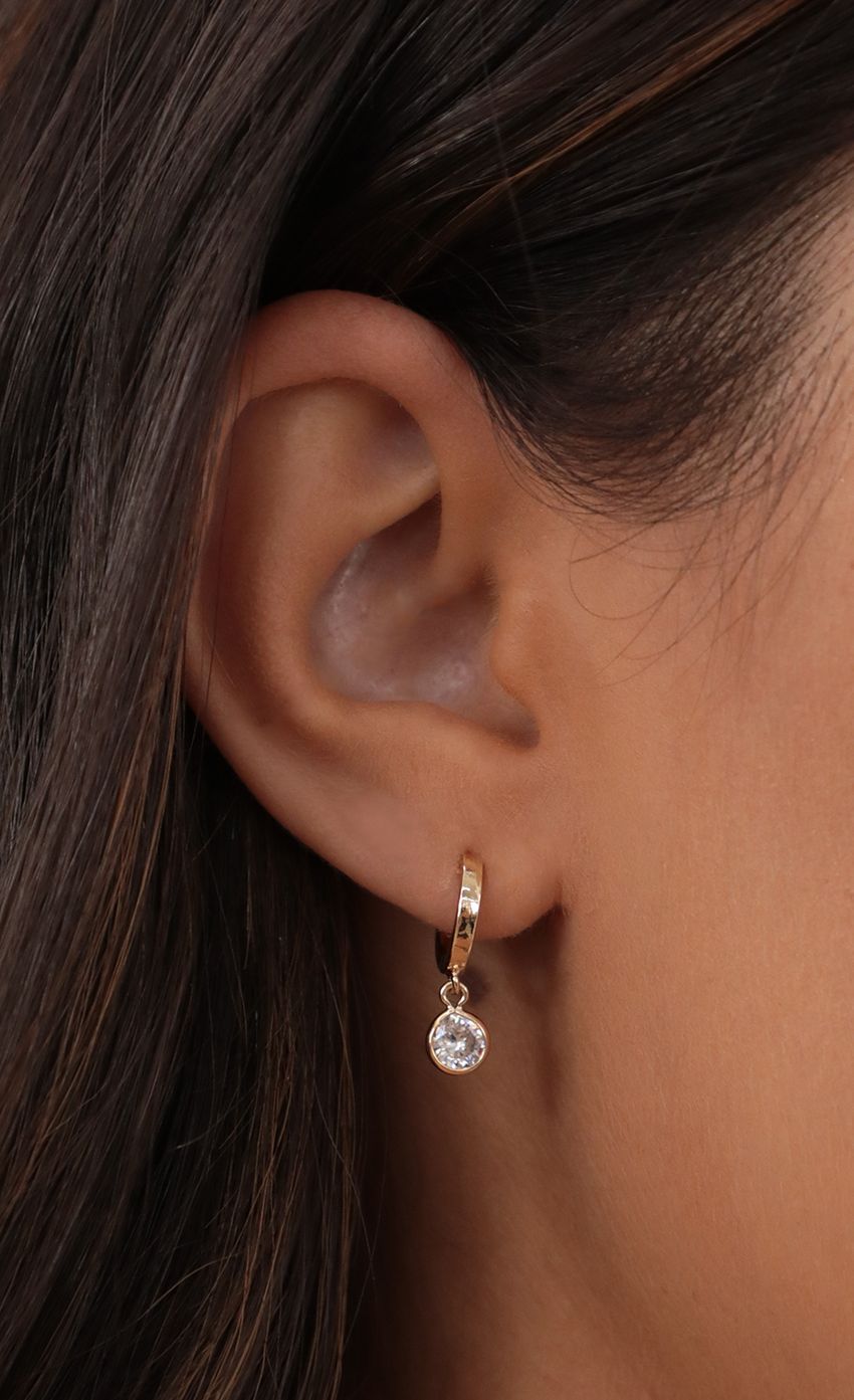 Picture Floating Crystal Huggie Earrings. Source: https://media-img.lucyinthesky.com/data/May21_1/850xAUTO/AT2A4930.JPG