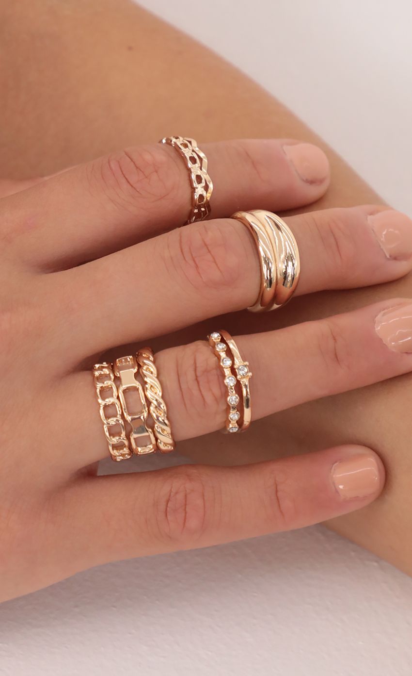 Picture Gold Chain Ring Set. Source: https://media-img.lucyinthesky.com/data/May21_1/850xAUTO/AT2A6434.JPG