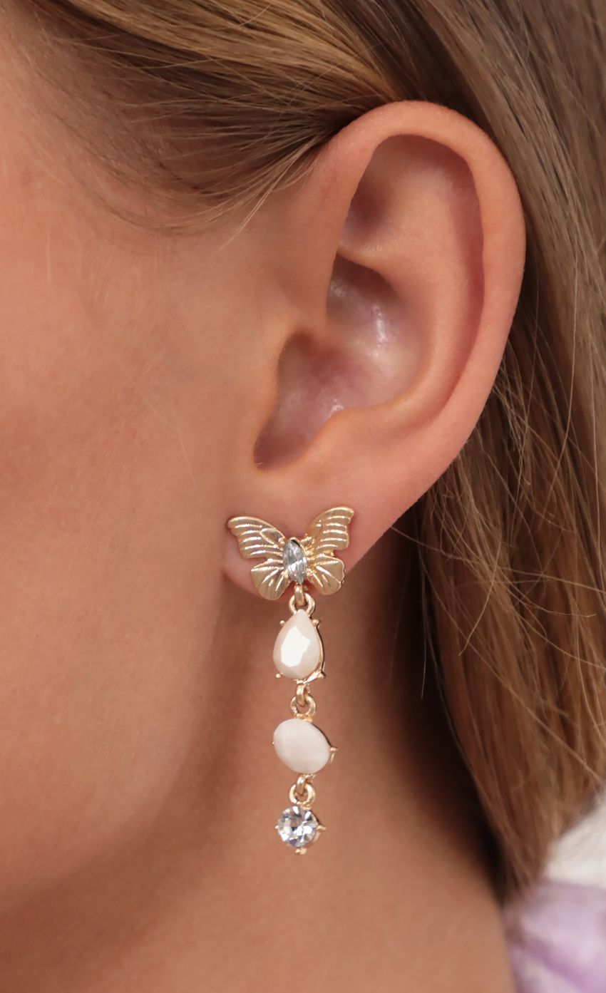 Picture Butterfly Stud with Dangly Crystals. Source: https://media-img.lucyinthesky.com/data/May21_1/850xAUTO/AT2A7304.JPG