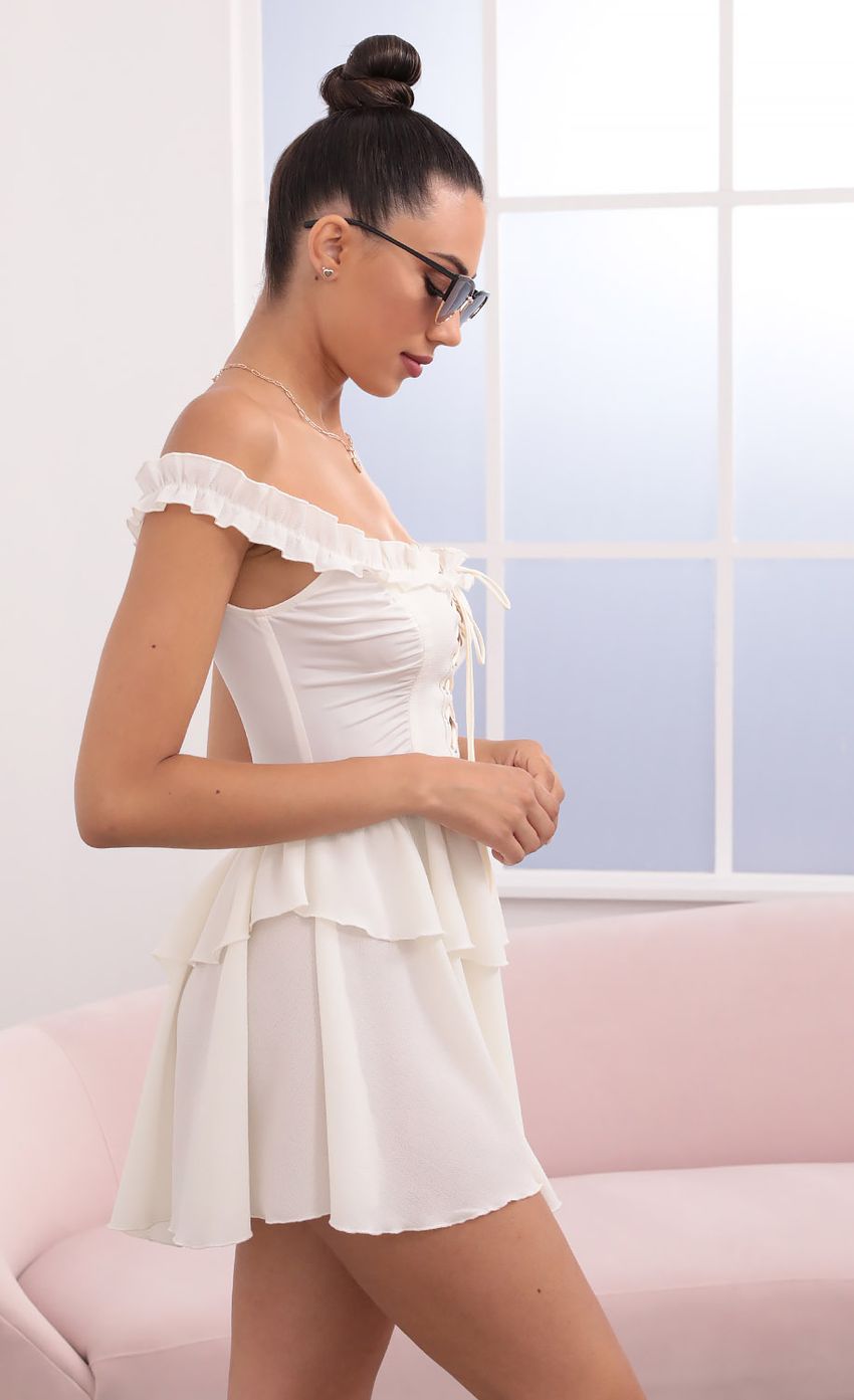 Picture Off The Shoulder Lace Up Dress in Ivory. Source: https://media-img.lucyinthesky.com/data/May21_2/850xAUTO/1V9A0583.JPG