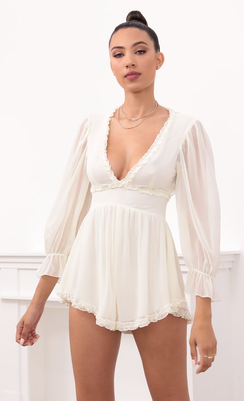 Picture Ruched Ruffle Romper in Ivory. Source: https://media-img.lucyinthesky.com/data/May21_2/850xAUTO/1V9A1433.JPG