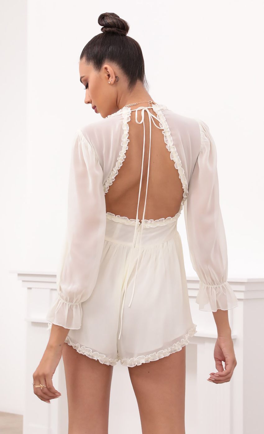 Picture Ruched Ruffle Romper in Ivory. Source: https://media-img.lucyinthesky.com/data/May21_2/850xAUTO/1V9A1504.JPG