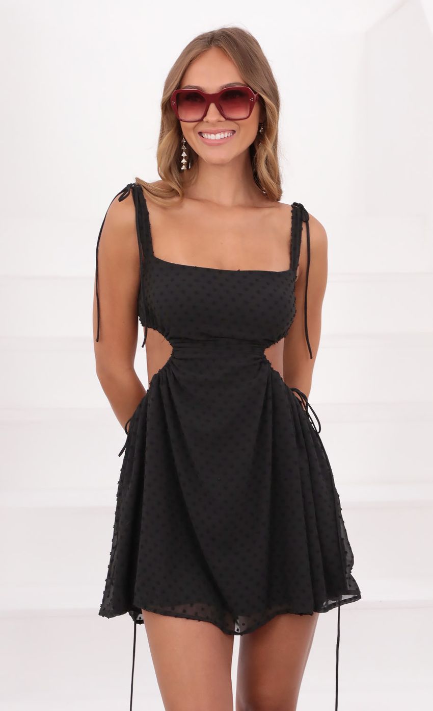 Picture Cutout Dress in Black Dotted Chiffon. Source: https://media-img.lucyinthesky.com/data/May21_2/850xAUTO/1V9A16261.JPG
