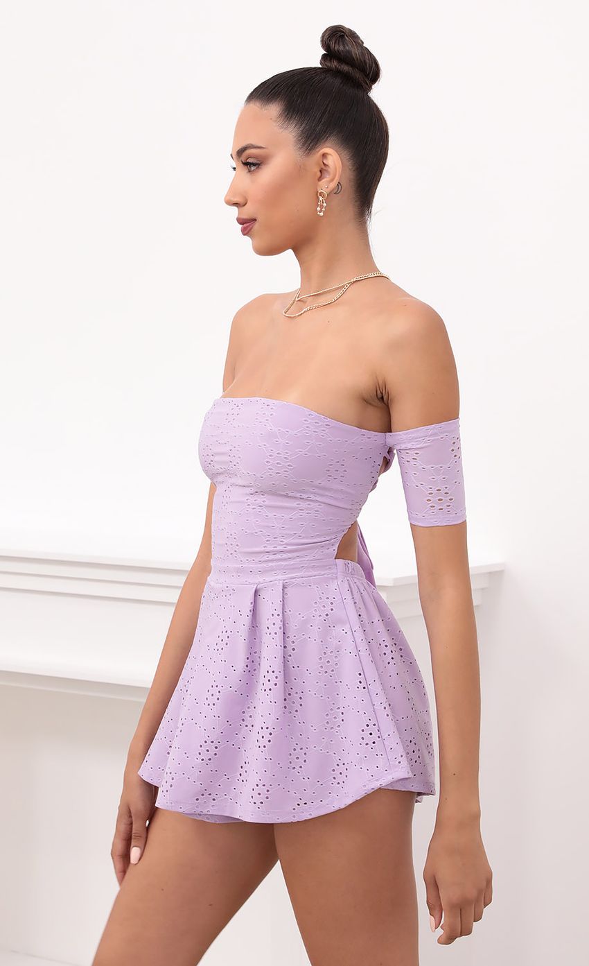 Picture Lavender Eyelet Lace-Up Romper. Source: https://media-img.lucyinthesky.com/data/May21_2/850xAUTO/1V9A2675.JPG