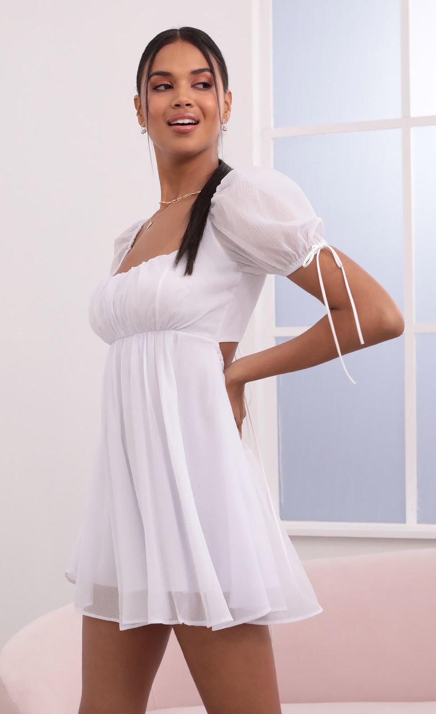 Picture Crinkle Chiffon Baby Doll Dress in White. Source: https://media-img.lucyinthesky.com/data/May21_2/850xAUTO/1V9A3927.JPG