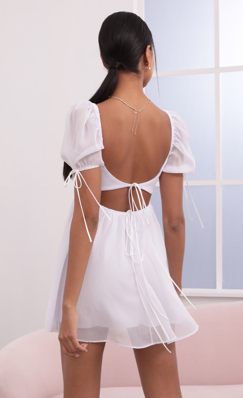 Picture Crinkle Chiffon Baby Doll Dress in White. Source: https://media-img.lucyinthesky.com/data/May21_2/850xAUTO/1V9A3970.JPG
