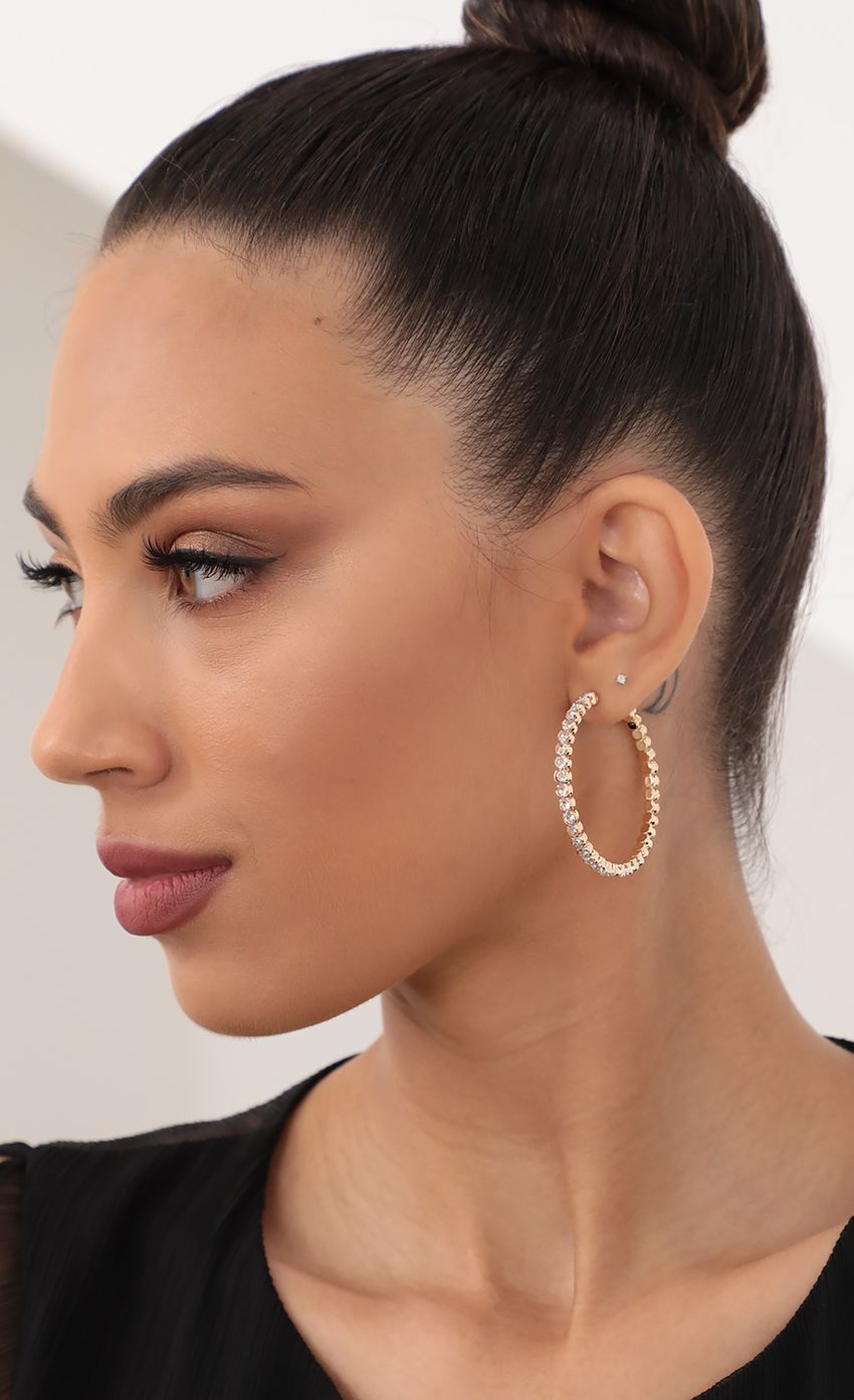 Picture Crystal Studded Hoops in Gold. Source: https://media-img.lucyinthesky.com/data/May21_2/850xAUTO/AT2A0510.JPG